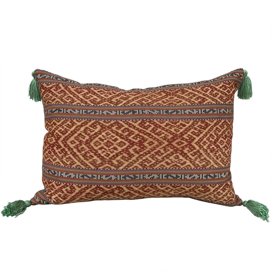 Timor ikat cushion with green tassels