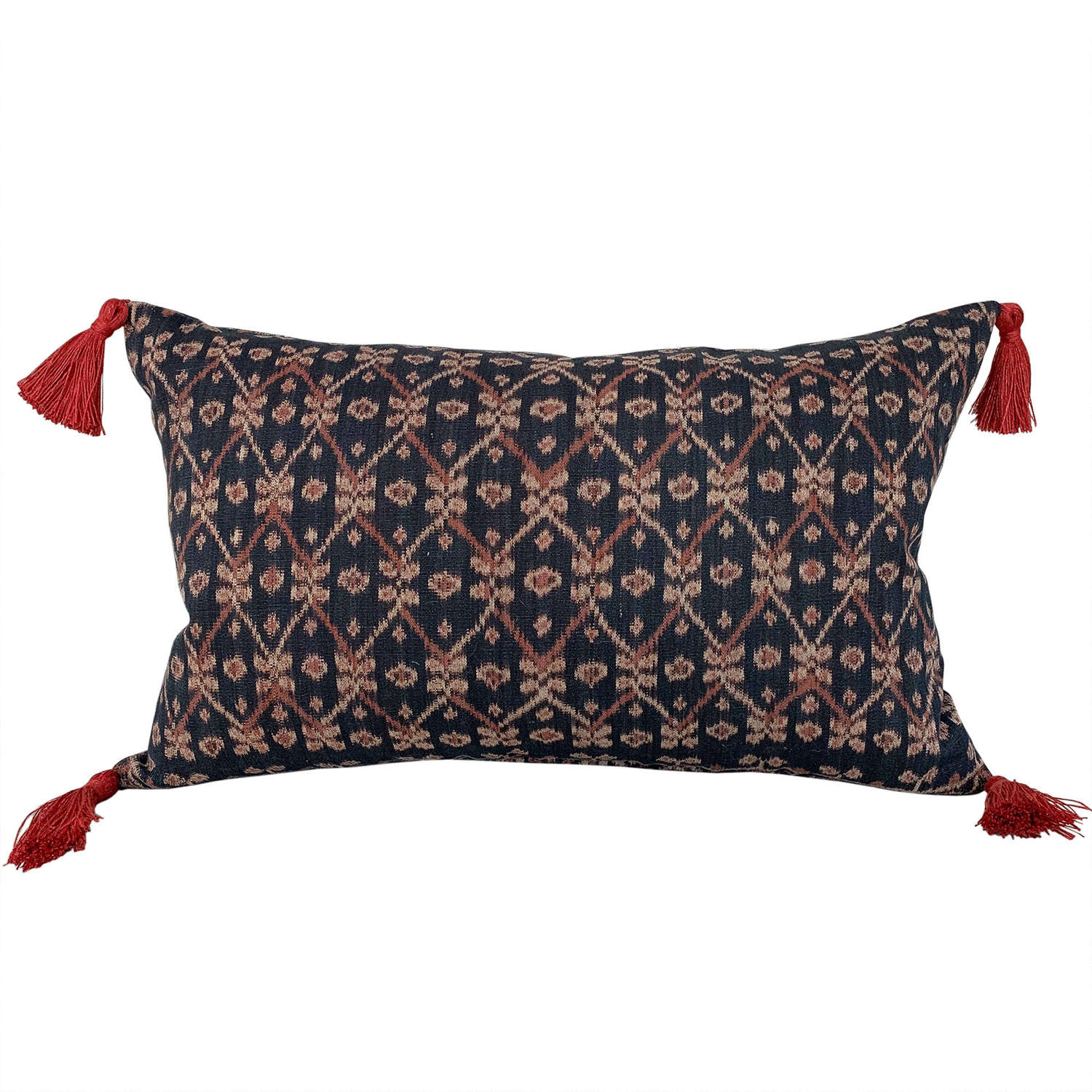 Flores ikat cushions with rust coloured tassels