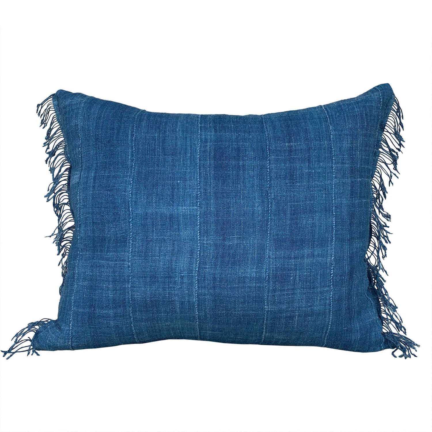 Indigo Mossi cushions with fringed sides