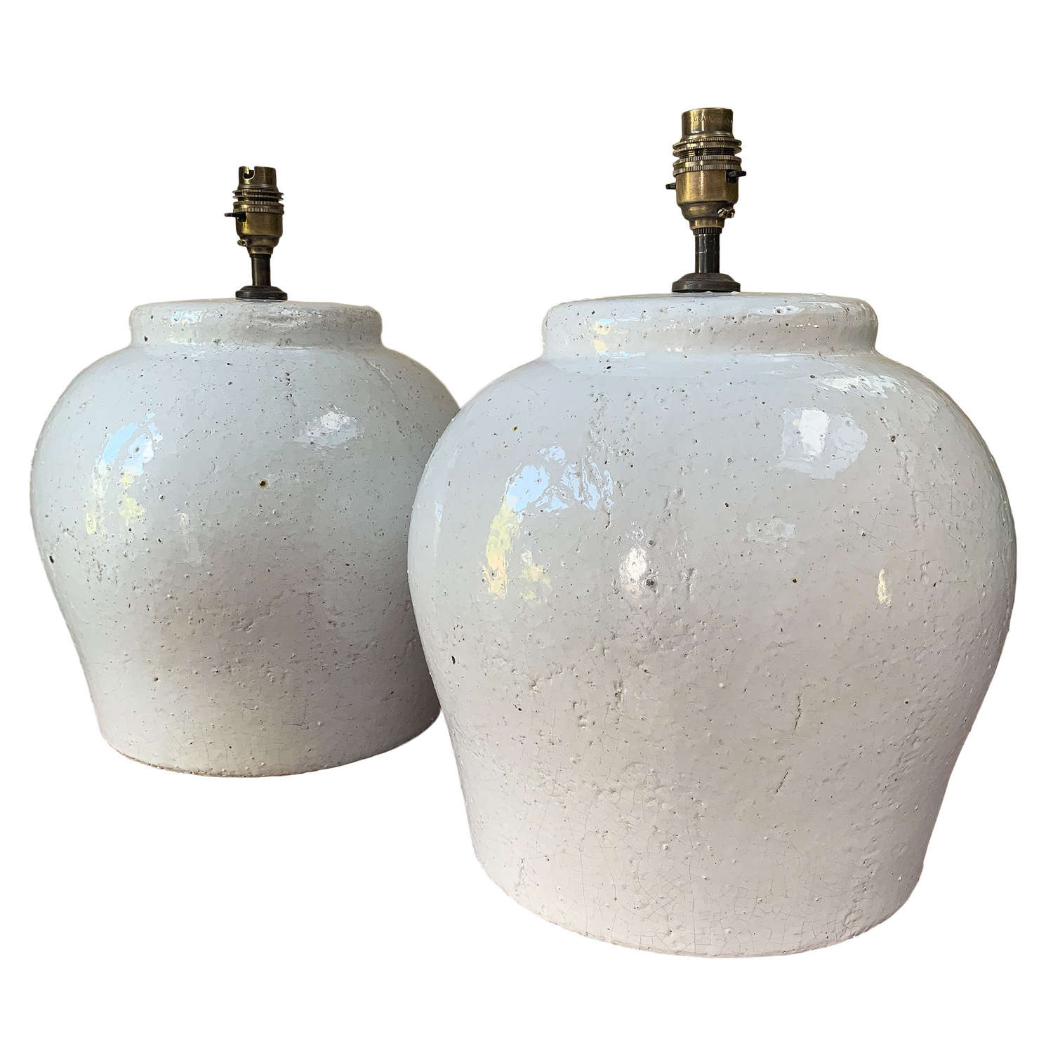 Pair of glazed terracotta lamps