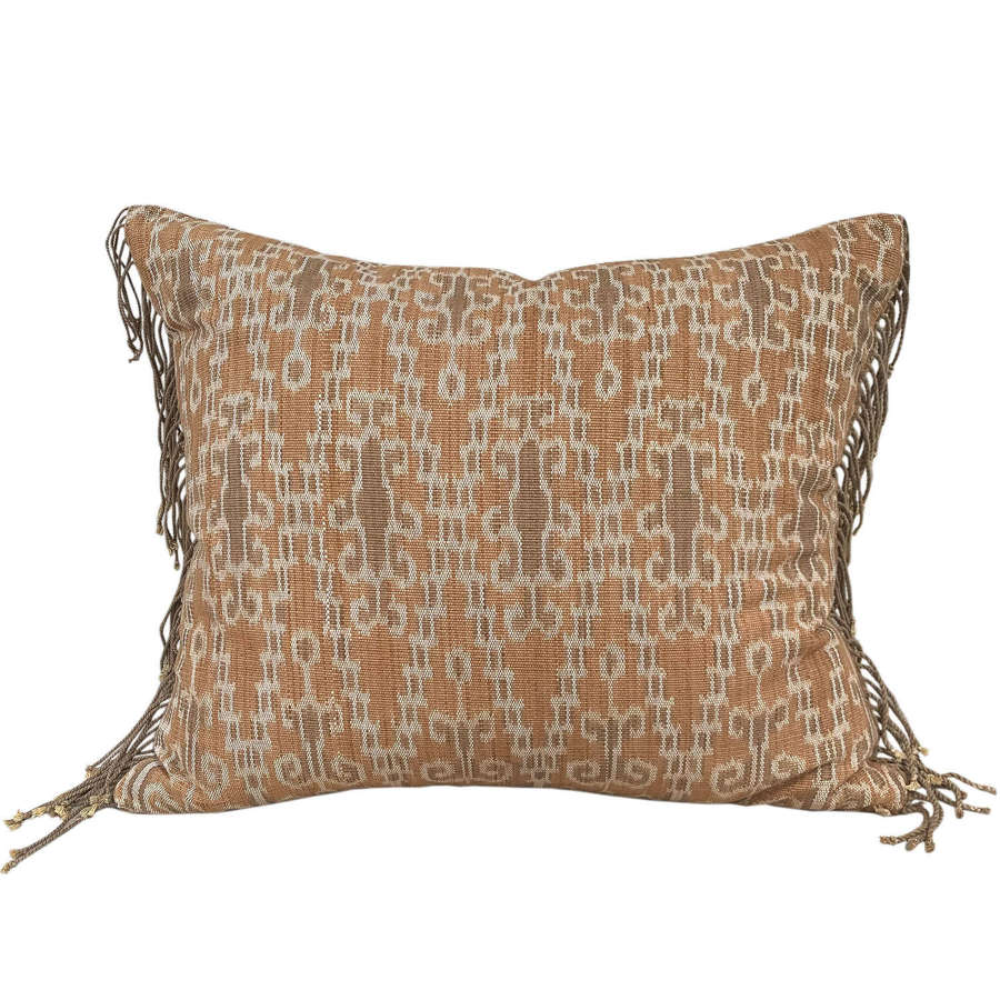 Dayak ikat cushion with fringed ends