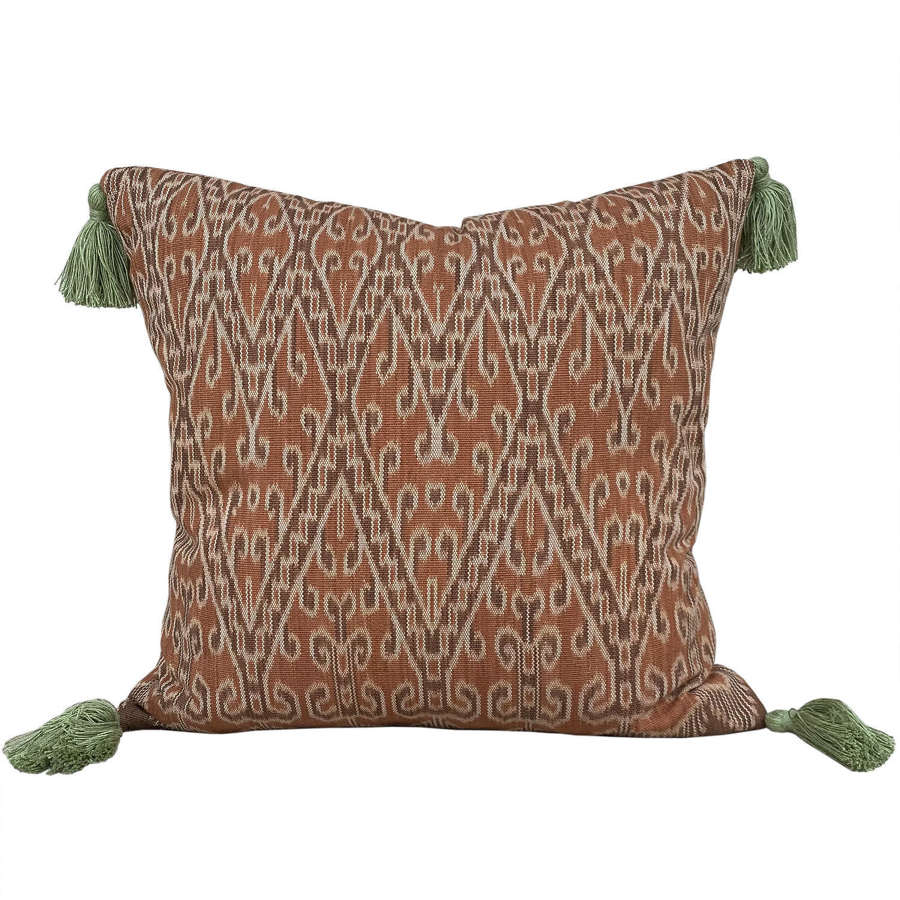 Dayak cushions with green tassels