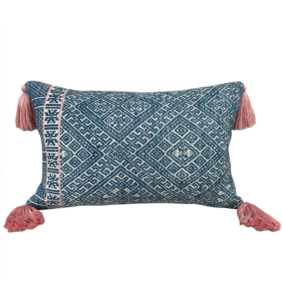 Dai cushion with pink tassels