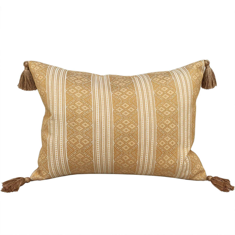Yellow gold cushions with tassels
